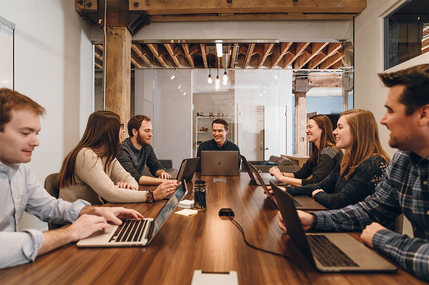 The LaunchPad Lab team having a meeting in a boardroom